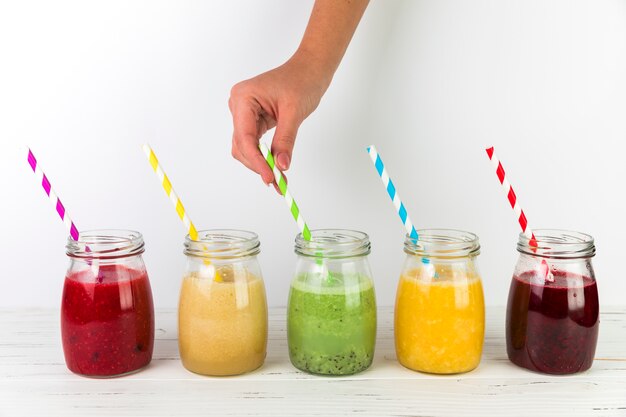 Arrangement of colourful smoothies