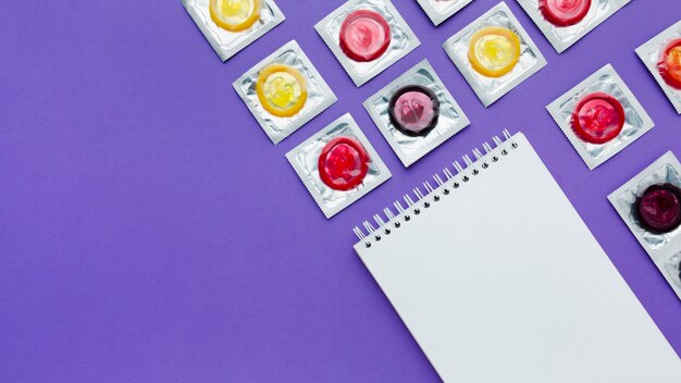 arrangement of contraception concept on purple background with copy space