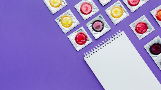 arrangement of contraception concept on purple background with copy space