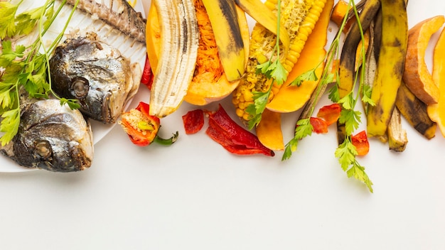 Arrangement cooked fish and leftovers