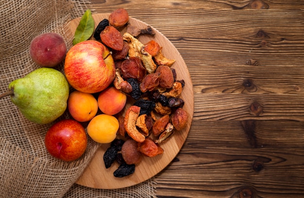 Arrangement of delicious autumnal fruits with copy space