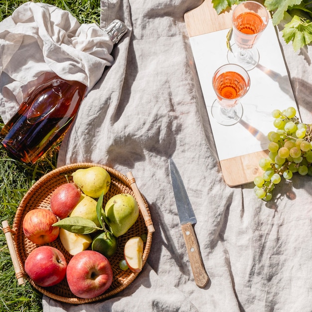 Arrangement of delicious picnic goodies on a blanket