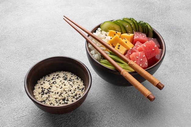 Free photo arrangement of delicious poke bowl