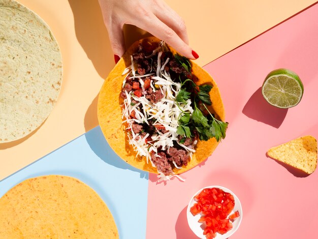 Arrangement of delicious taco bread and ingredients