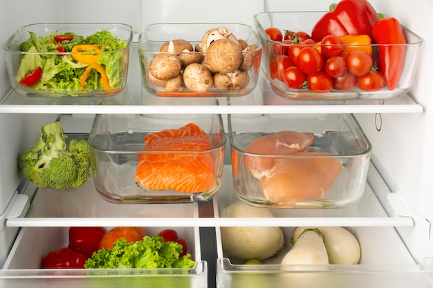 Arrangement of different foods organized in the fridge