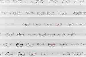 Free photo arrangement of different glasses on shelves