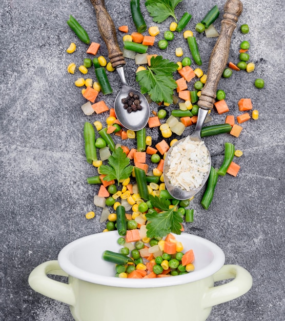 Arrangement of different ingredients on cement background