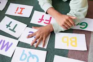 Free photo arrangement of different letters for speech therapy sessions