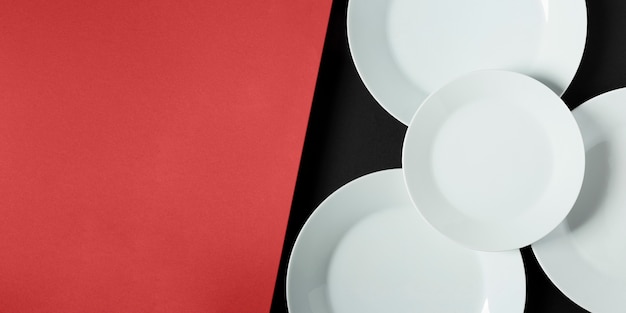 Arrangement of different sized plates with copy space