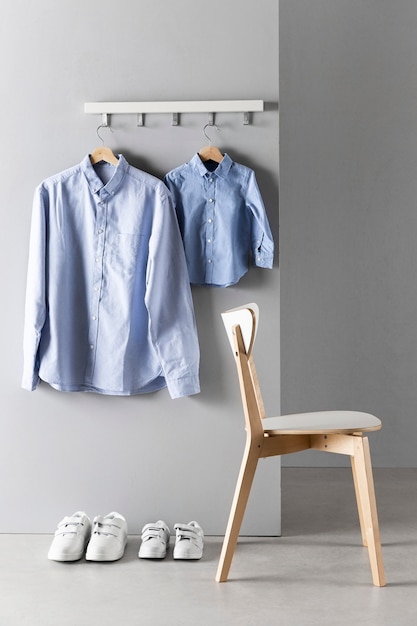 Free photo arrangement of father and son clothing