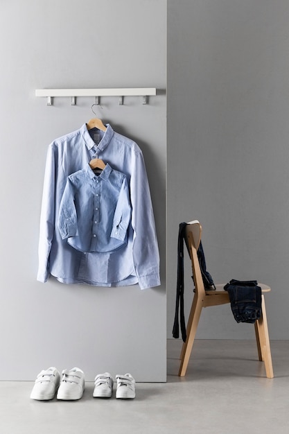 Arrangement of father and son clothing