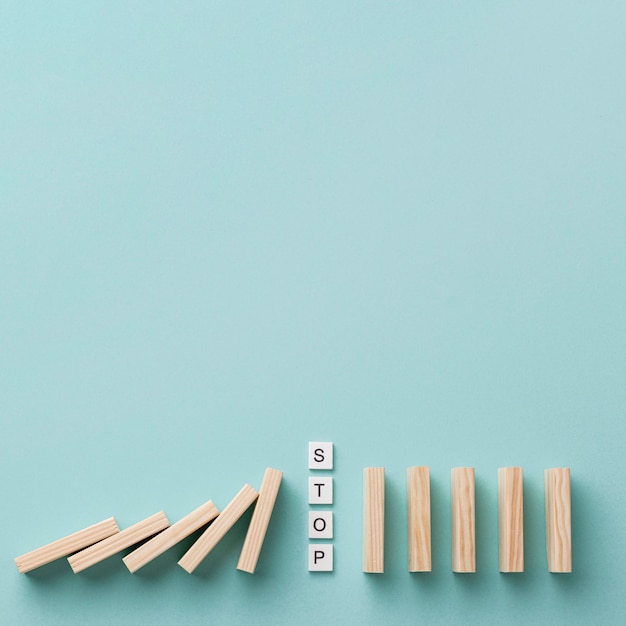 Arrangement of financial crisis with wooden pieces