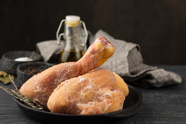 Arrangement of frozen chicken on the table