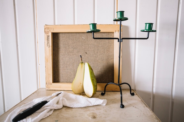 Arrangement of fruit with candlestick