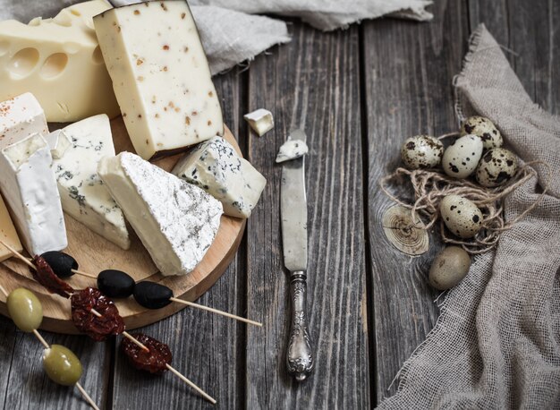 arrangement of gourmet cheeses