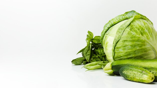 Arrangement of green fresh vegetables with copy space