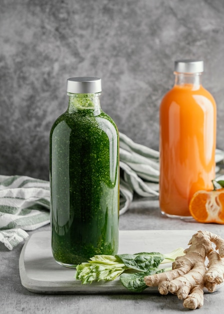 Arrangement of healthy drinks in glass bottles