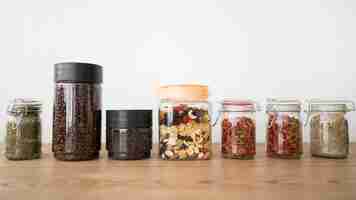 Free photo arrangement of jars with different ingredients