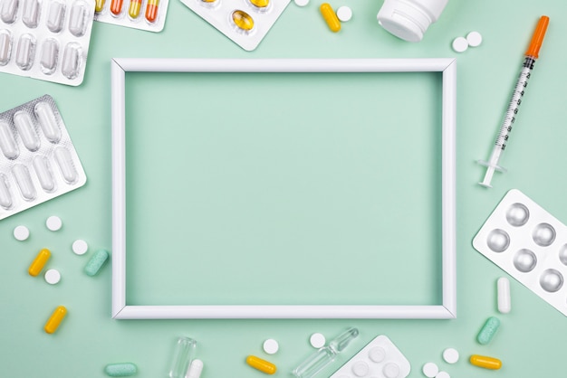 Free photo arrangement of medical objects with empty frame