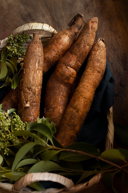 Free photo arrangement of nutritious cassava roots