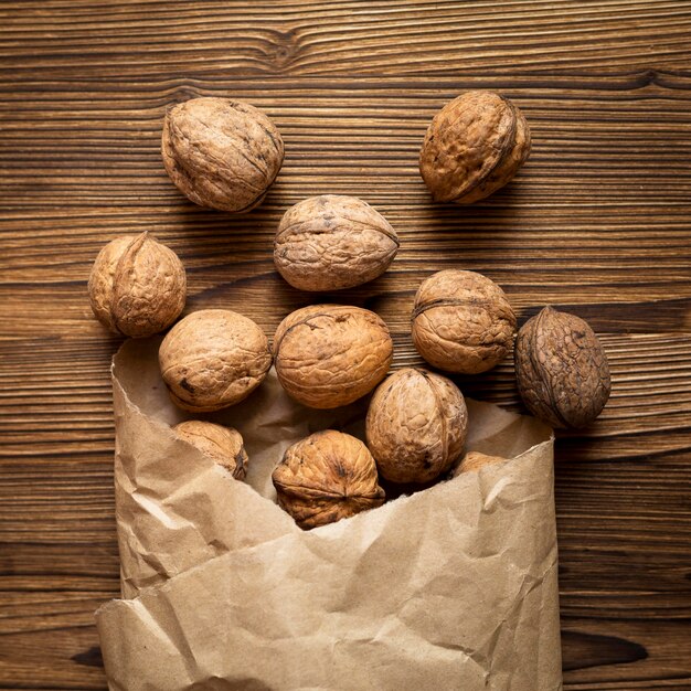 Arrangement of nuts on wooden background