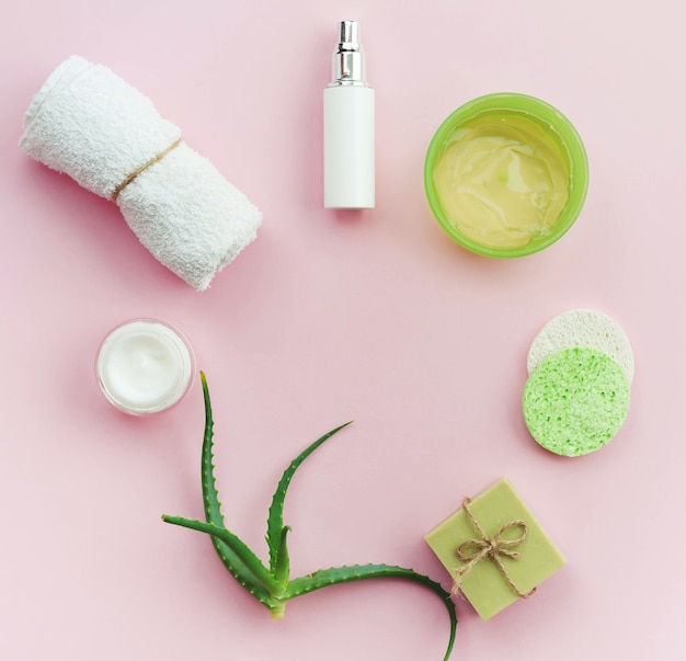 Free photo arrangement of spa body creams and soap flat lay