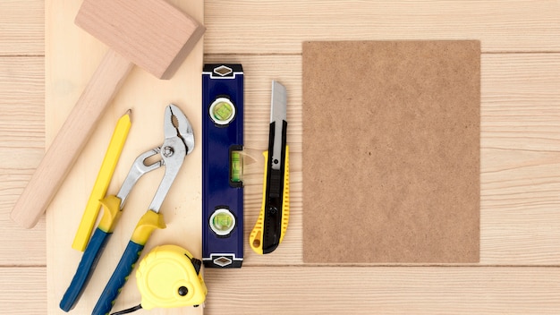 Free photo arrangement of tools for carpentry on desk copy space