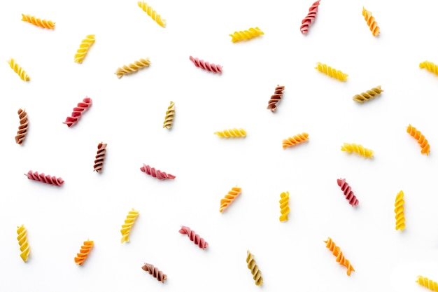 Arrangement of uncooked colorful fusilli