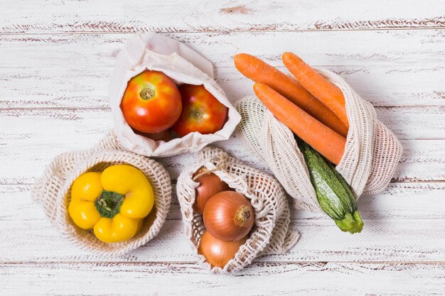 Arrangement of vegetables on wooden background