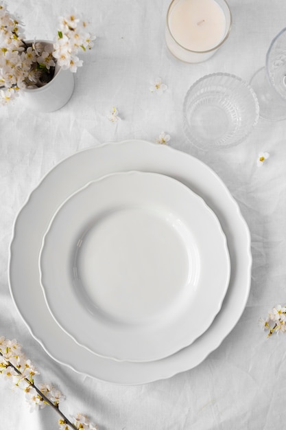 Free photo arrangement of white table for a delicious meal