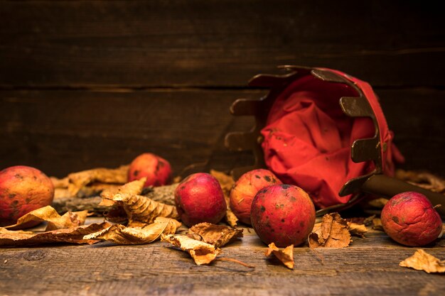 Arrangement with basket and red apples