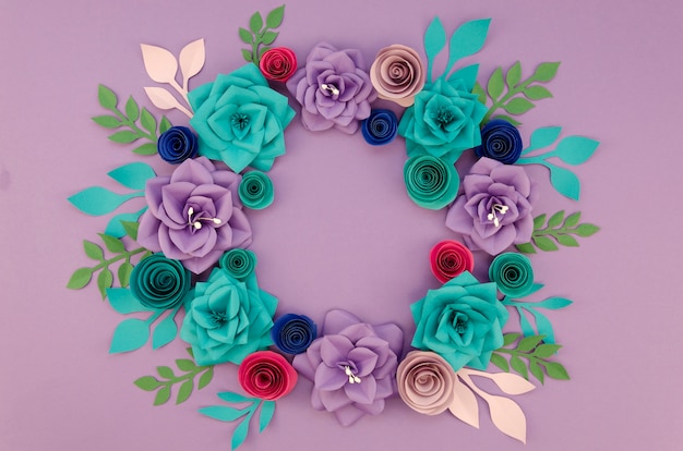 Arrangement with beautiful wreath and purple background