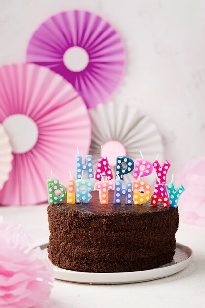 Free photo arrangement with birthday chocolate cake and candles