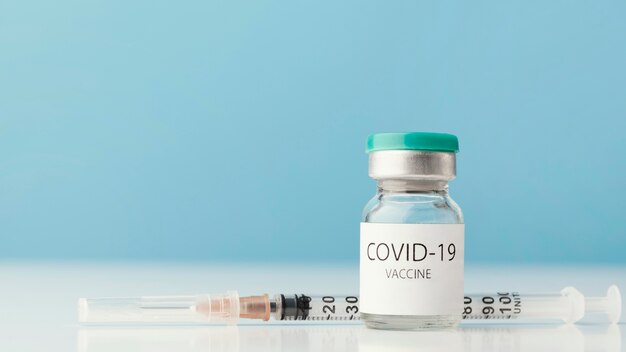 Arrangement with coronavirus vaccine bottle