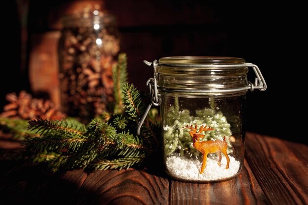 Arrangement with decorated jar and twigs