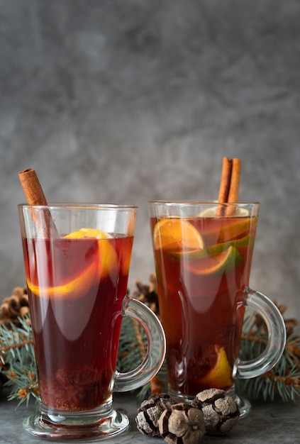 Arrangement with delicious drink and cinnamon sticks