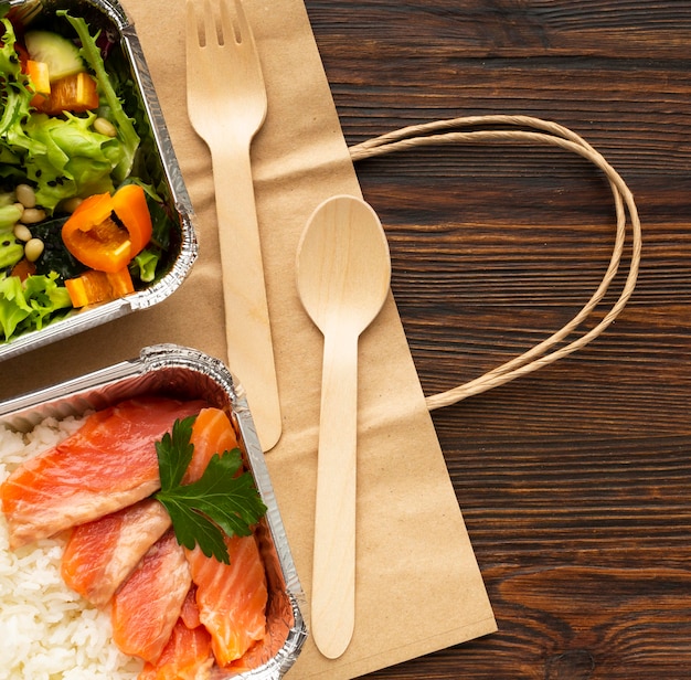 Arrangement with different meals on a wooden table