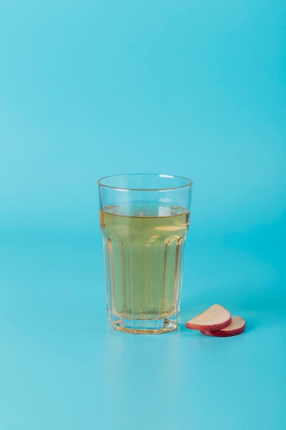Arrangement with drink on blue background
