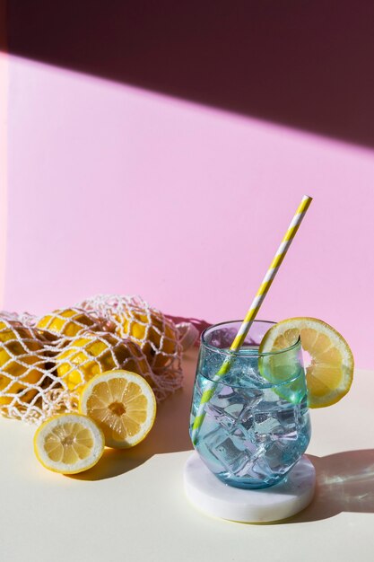 Arrangement with drink and lemons