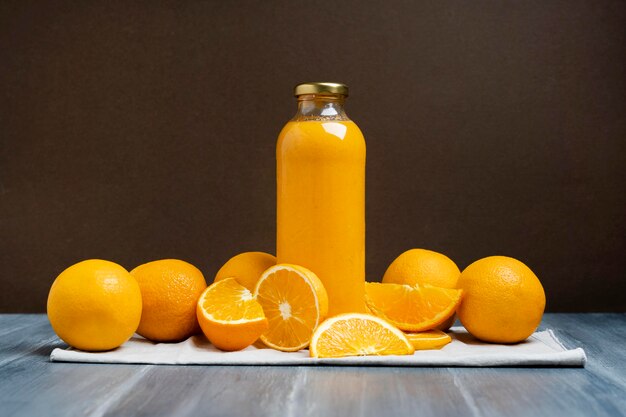 Arrangement with drink and oranges