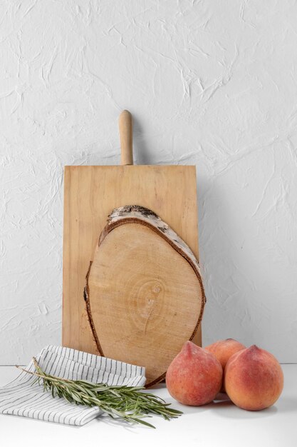 Arrangement with fruits and wooden board