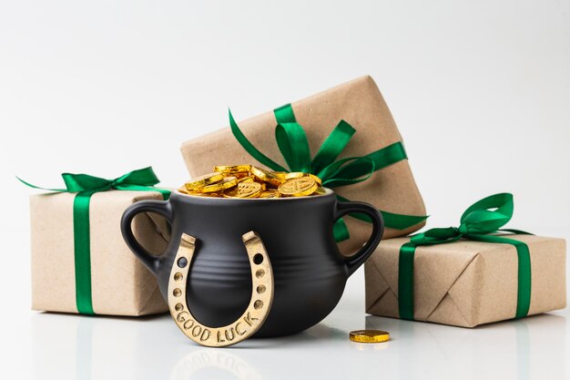 Arrangement with gifts and cauldron