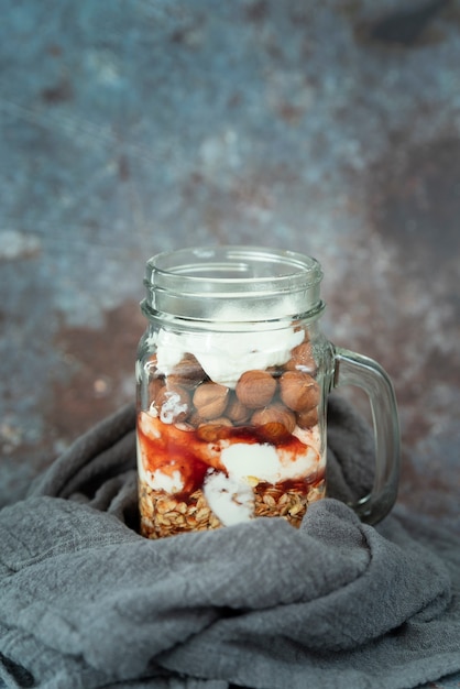 Arrangement with jar with delicious desert