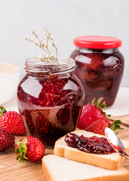 Arrangement with jars of strawberry jam