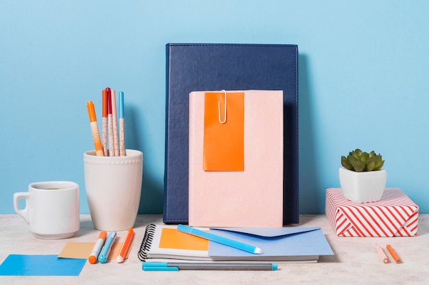 Arrangement with notebooks and envelope