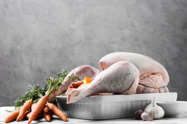 Free photo arrangement with raw turkey tray