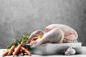 Free photo arrangement with raw turkey tray