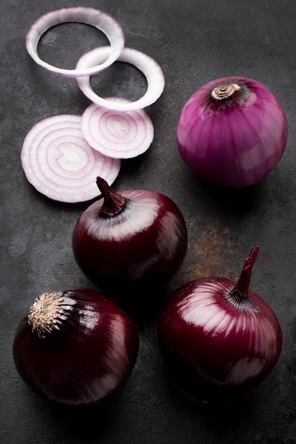 Free photo arrangement with red onions top view