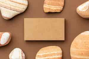 Free photo arrangement with stationery elements on brown