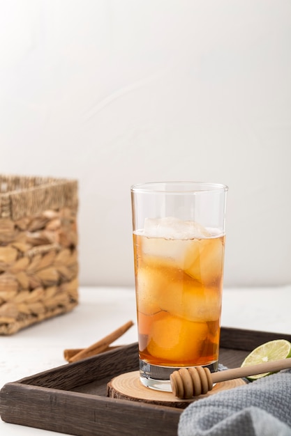 Arrangement with tasty drink and lime slice